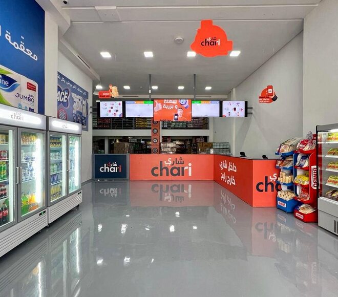 A neighbourhood grocery shop used as a luggage drop-off point